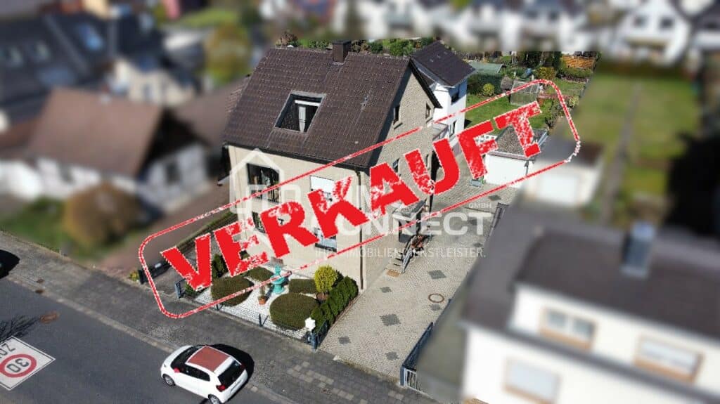 Aufgeteiltes Zweifamilienhaus mit Garten in super Lage von Hangelar mit 2 Garagen zu verkaufen!